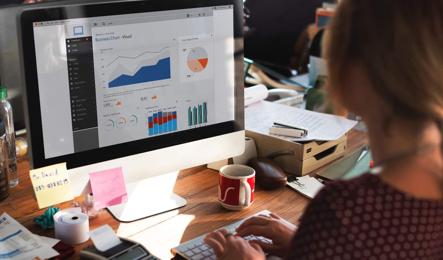 An accountant working on a presentation